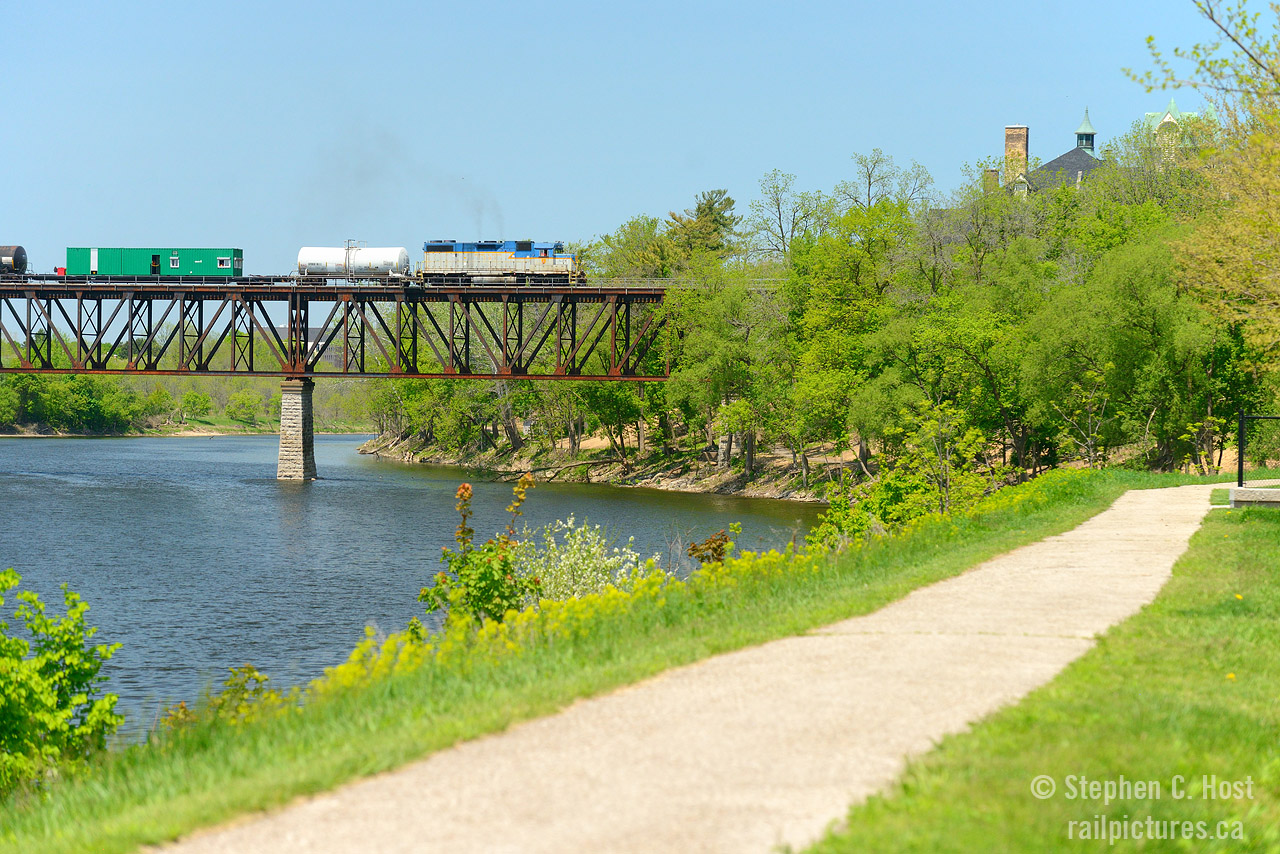 CP's "Weed Train" (No, not that kind of weed) passes through the quaint town of Galt, Ontario passing over the Grand River. D&H 7303 made this a fan favourite for the second year in a row (7304 in the year prior). This nice scene has already changed as pedestrian lights are being installed all along this path in this very spot. Not sure if they'll add to the scene or take away, but one thing is certian: change is always just around the corner.