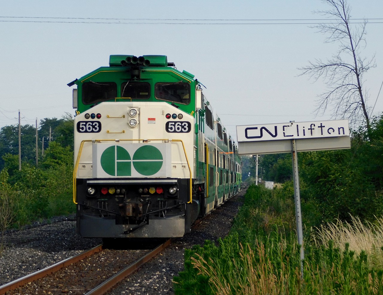 GO F59PH #563 pushes Niagara Falls excursion GO train #787 towards the Niagara Falls VIA station as it passes CN Clifton on the Grimsby Subdivision.