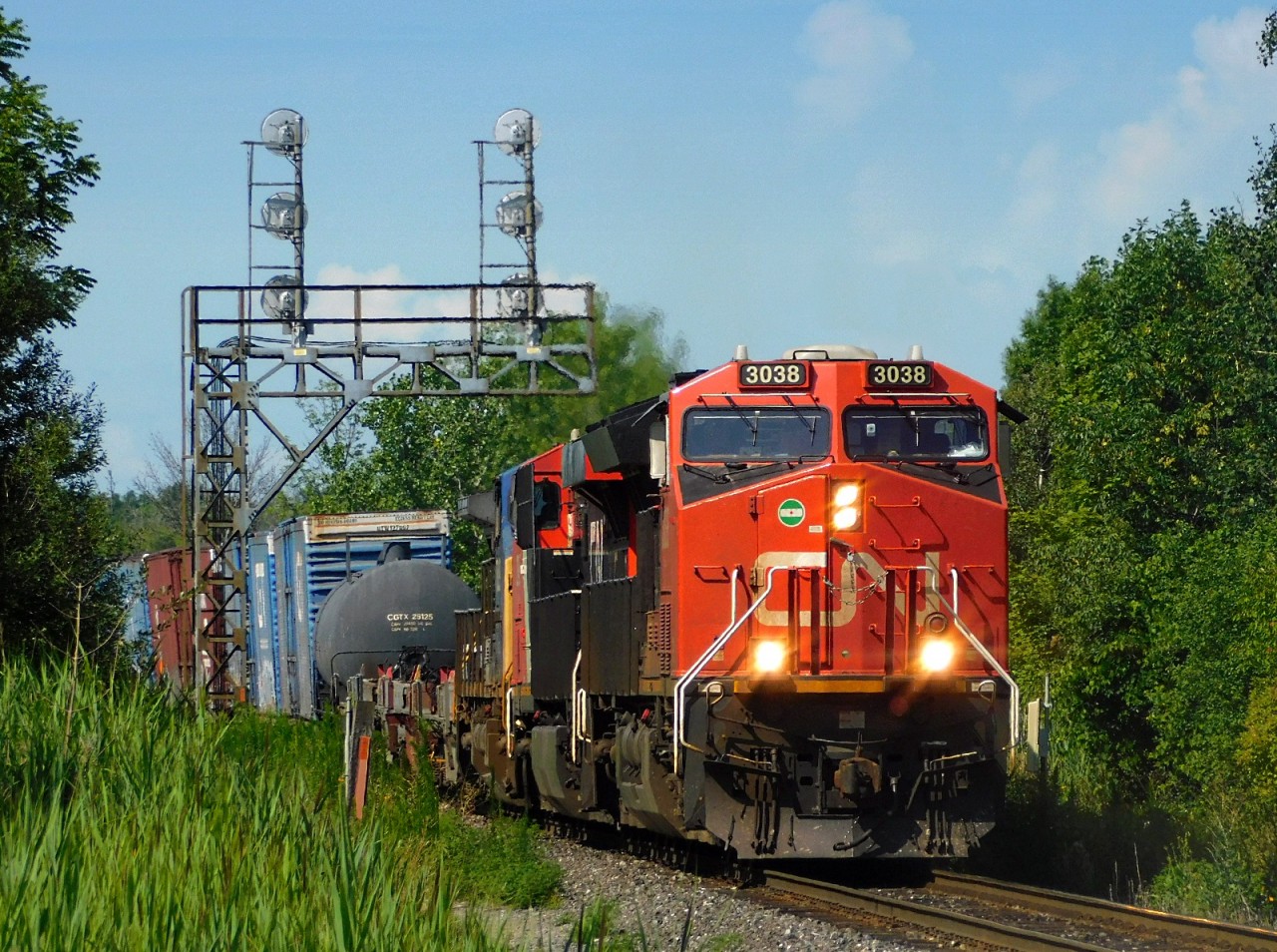 CN A422 crawls out of the Port Robinson yard on the Stamford Subdivision with a trio of GEs bound for Toronto's Macmillan Yard.