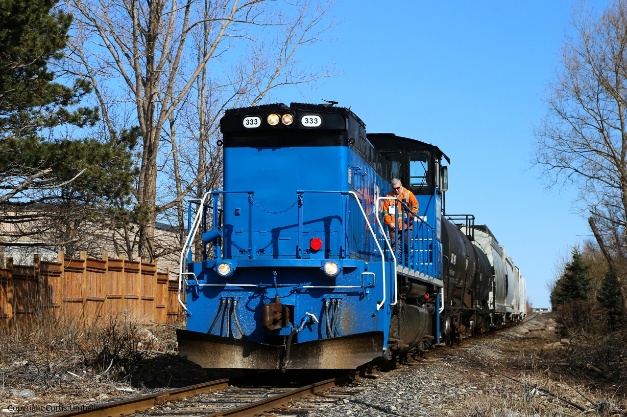 The Conductor From the Twice a week Trillium Run Gets ready to get off 333 and throw the switch into the CPR/OBRY Interchange  Finally good to be out after a harsh Winter on the YYZ Ramp and not being able to shoot much during the Weather Happy Spring everyone :)