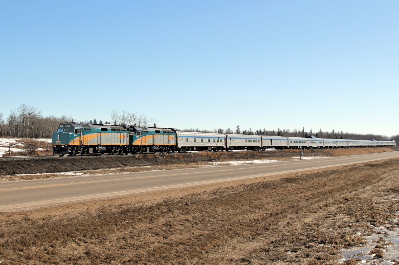 VIA 6438 and 6457 cruise through North Cooking Lake with Train #1.