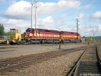 More power from parent Wisconsin Central on the Algoma Central: WC SD45's 6529 & 6636 are seen at Steelton Yard in Sault Ste. Marie. The EMD SD45 model was never purchased by any Canadian railways, but WC's fleet of secondhand 45's purchased from other US railroads did make inroads on the ACR. These two units were originally built for the Burlington Northern and the Seaboard Coast Line respectively.