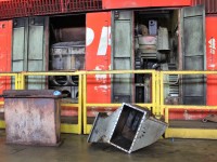 SD40-2 5750 has it's exhaust section on the floor to the left while other parts necessary for a turbo change out are being removed.