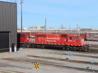 SD40-2 6621 on shop track 6 west with the Markham Road overpass visible in the background.