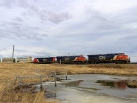 Approaching the New Brunswick/Nova Scotia border, CN 2285 is in charge of intermodal train Q120, as they pass by Fort Beasejour, New Brunswick, less than a KM away from entering Nova Scotia. 