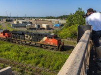 A few foamers, along with myself, shoot CN 2909, leading train 305, as they're putting their train together at CN Gordon Yard in Moncton, New Brunswick. Nothing special about this train, just another one to shoot. 
