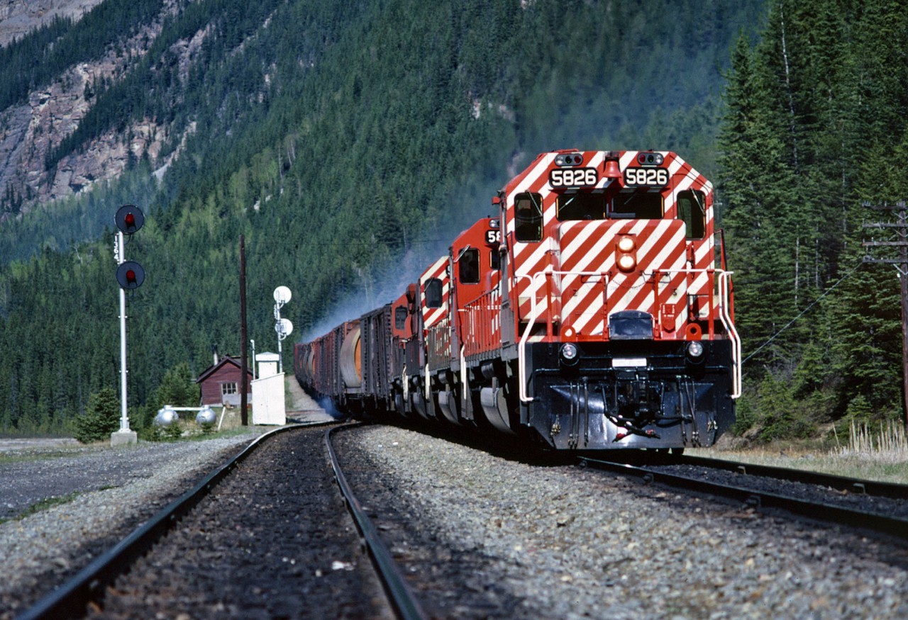 The air behind the leads units is thick with brake shoe smoke as CP Extra 5826 West descends the final stretch of "the big hill" into Field BC.  5826 is already just over 5 years old, but just like the rest of the motive power consist, she sure looks well cared for.