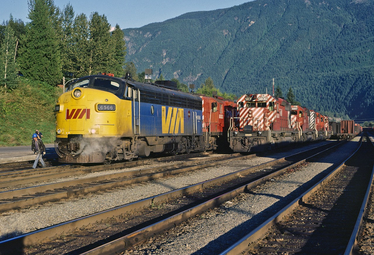 Busy time and a great array of power at Revelstoke. 651, a westbound sulpher train is cutting off the 5830 and it will head to the shop. With 5847 leading, 651 head to Kamloops following Via 1.  With the Laggan and Mountain Subs behind her, 651 no longer needs the extra 3000 horses.  While this is occurring, VIA 1 is being watered and serviced and quite likely, and number of passengers are stretching their legs and taking in this gorgeous mountain evening.