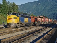 Busy time and a great array of power at Revelstoke. 651, a westbound sulpher train is cutting off the 5830 and it will head to the shop. With 5847 leading, 651 head to Kamloops following Via 1.  With the Laggan and Mountain Subs behind her, 651 no longer needs the extra 3000 horses.  While this is occurring, VIA 1 is being watered and serviced and quite likely, and number of passengers are stretching their legs and taking in this gorgeous mountain evening. 