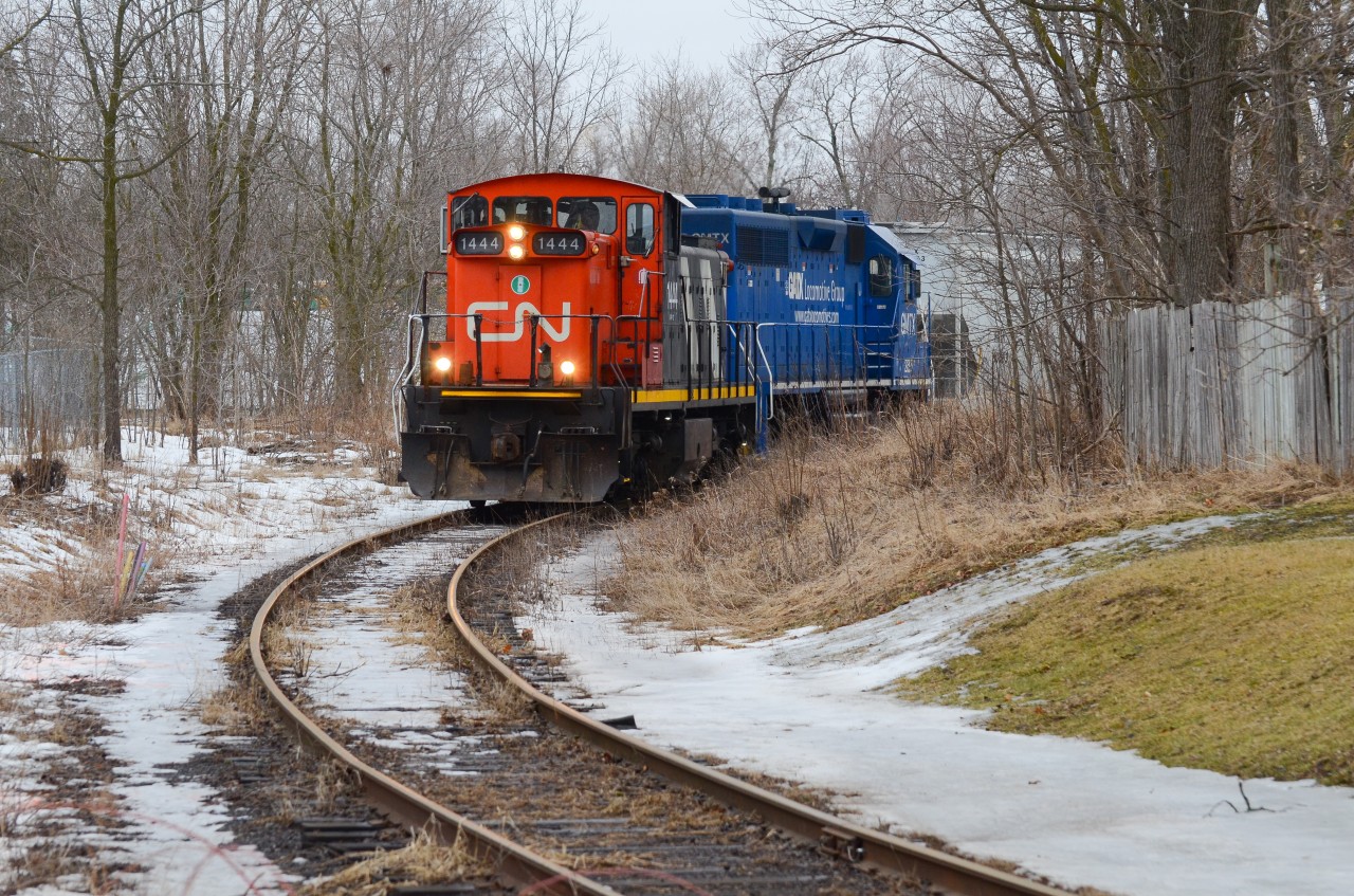 CN 1444 backs L542s train back to XV Yard and eventually head to North Guelph to interchange with the Guelph Junction Railway.