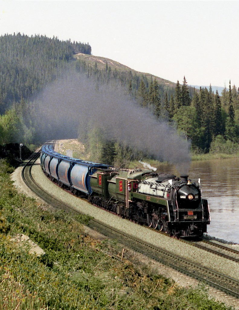 Alberta owned ex CN 4-8-2 6060 on a run from Jasper Alberta to Expo 86 in Vancouver passes Angus Horn siding along the North Thompson River. The train will tie up at Kamloops before continuing on to the coast