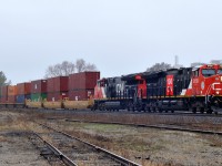 CN 3150, and CN 3156 bring Q14891 18 through Brantford with 158 cars on a rather dull and dreary April afternoon.

3150 is sporting a logo in celebration of CN's 100th anniversary