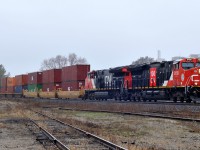 CN 3150, and CN 3156 bring Q14891 18 through Brantford with 158 cars on a rather dull and dreary April afternoon.

3150 is sporting a logo in celebration of CN's 100th anniversary