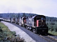 September 6th, 1970 sees train 308, running as time table train 894, heading east out of Capreol, Ontario on the now abandoned Alderdale Sub.  Power for the train is C424 3213 C630 2015 C424 3227 and along for the ride a dead C630 2024.  Actual location is about 3 miles east of Capreol.