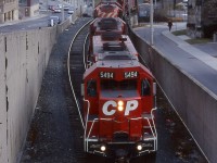 Back when the SD40's were plentiful on CP and almost as overdone as todays GE's the best catches on CP were the fleet of second hand SD40 numbered in the 5400's. For me the 5490's were the best catch as they were not always easy to find and usually had an interesting history. Train 167 this day had a former Southern Pacific SD45 on the point, while internally the unit was rebuilt into an SD40 it was still nice catching a rare SD45 body in the lead. The train is seen about to duck into Hunter Street tunnel and most likely to the CN Oakville subdivision as a short cut to CANPA yard before continuing onto Toronto. 
