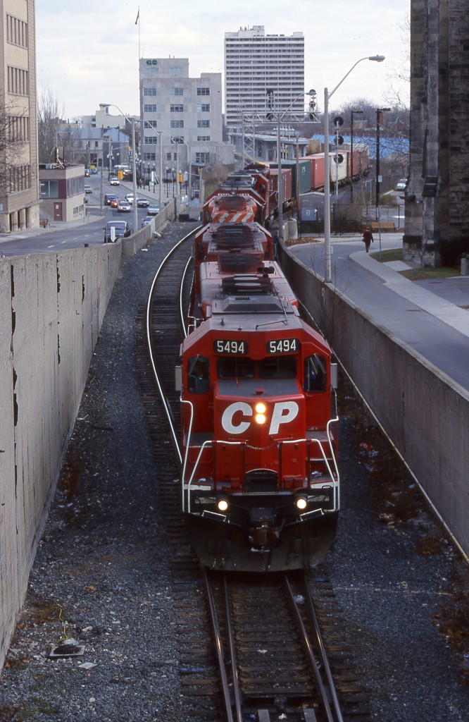 Back when the SD40's were plentiful on CP and almost as overdone as todays GE's the best catches on CP were the fleet of second hand SD40 numbered in the 5400's. For me the 5490's were the best catch as they were not always easy to find and usually had an interesting history. Train 167 this day had a former Southern Pacific SD45 on the point, while internally the unit was rebuilt into an SD40 it was still nice catching a rare SD45 body in the lead. The train is seen about to duck into Hunter Street tunnel and most likely to the CN Oakville subdivision as a short cut to CANPA yard before continuing onto Toronto.