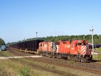 Mornings were always a good time on CP back in the early to mid 2000’s, with typically 3-4 trains through the junction within a 2-3 hour period. “Sprint” frame trains 141/142 through much of the 2000’s were pretty much the hottest trains running on the Galt subdivision and loaded train 142 was the best catch of the two considering it was loaded rather then simply empty flat cars like its counterpart. Running as a fairly light train and with no turning facilities at both St. Thomas and Oshawa. Control cab sets were typically the power for the train. While power set 1117 and 3057 were the normal power for the train it was possible to get another set filling in. September 5, 2001 was one of those days as I watched 3096/1102 pass my vantage point up on the hill at Guelph Jct. A lot has changed in the past 18 years at the junction since I framed this train and even the train today doesn’t exist. 