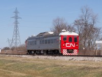 CN 1501 heads South through the town of Onondaga on the CN Hagersville Subdivision on a sunny Saturday morning.