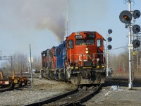 CN 538 is starting its shift as it heads into Coteau Yard with 4 units (CN 4708, GMTX 2260, CN 4140 & CN 4787), the third which is smoking quite heavily.