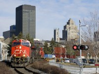 CN 149 has ET44AC's CN 3100 & CN 3073 and about 12,000 feet of intermodal traffic as it leaves the Port of Montreal.