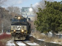 A trio of NS units (NS 9704, NS 7299 & NS 8076) are operating as CN 500 as they leave the Port of Montreal light power after bringing in CN 148 to the port. Normally CN 148 enters the port overnight, but they did not have room and CN had to park the train on track 29 a few miles west of here.
