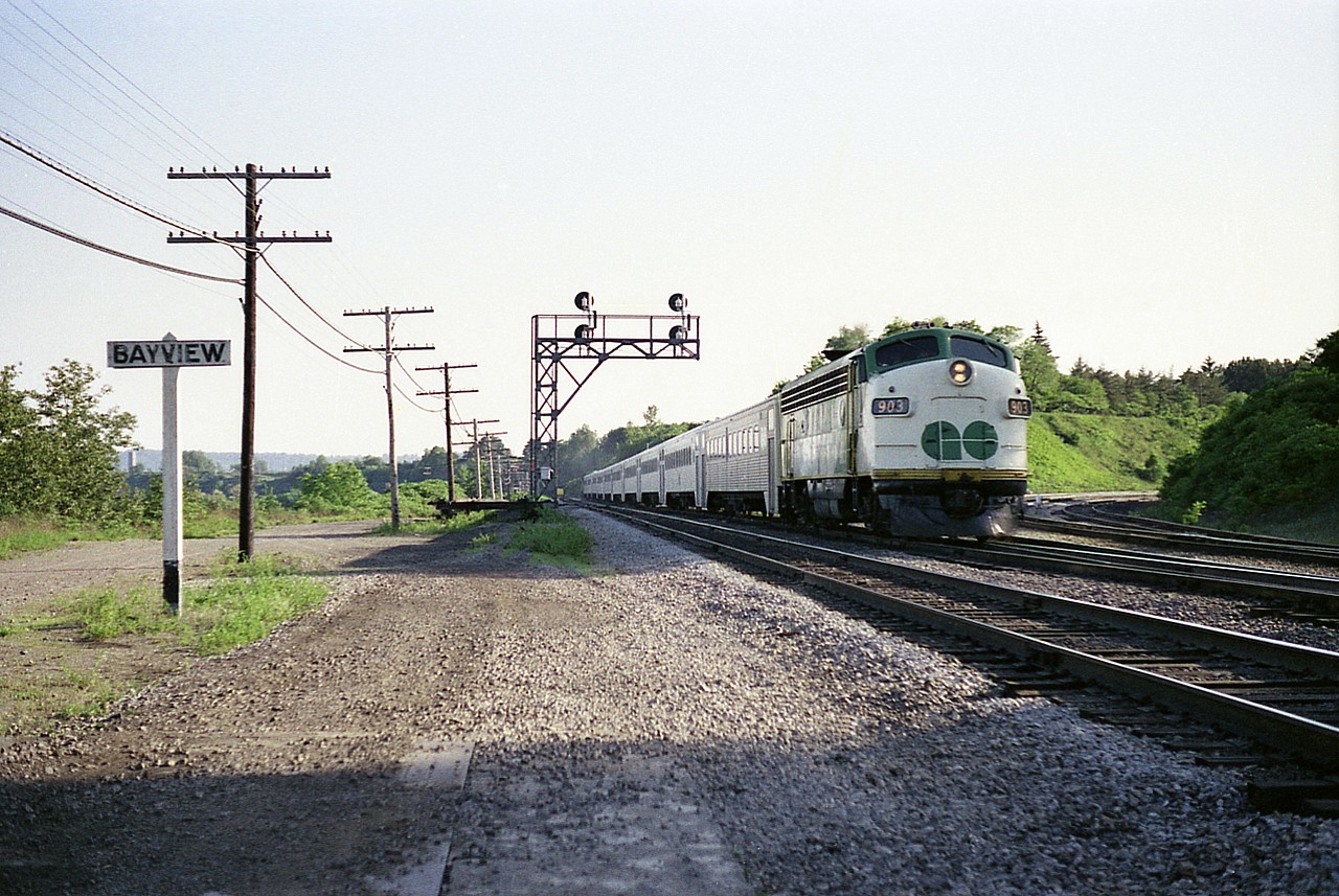This is a favourite image of mine. Yeah, it is only an old GO 903 shot of the train being pushed back toward Toronto, but bona fide geezers who lurk on this site will understand the feeling as one views this shot. Clean, simple and serene after dinner walk along the tracks at Bayview was a joy in the early evening back then. And this is a classic illustration of how it once was.
How did the world get so messed up?