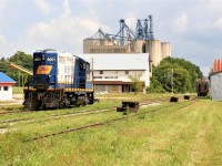 The scene at Clinton after Goderich-Exeter Railway (GEXR) train 581 set-off GP9 4001 before continuing their trek from Goderich to Stratford on the Goderich Subdivision. In the near future, the unit will be used to service the railway's Exeter Spur, which at the time served customers between Clinton and Centralia. 

