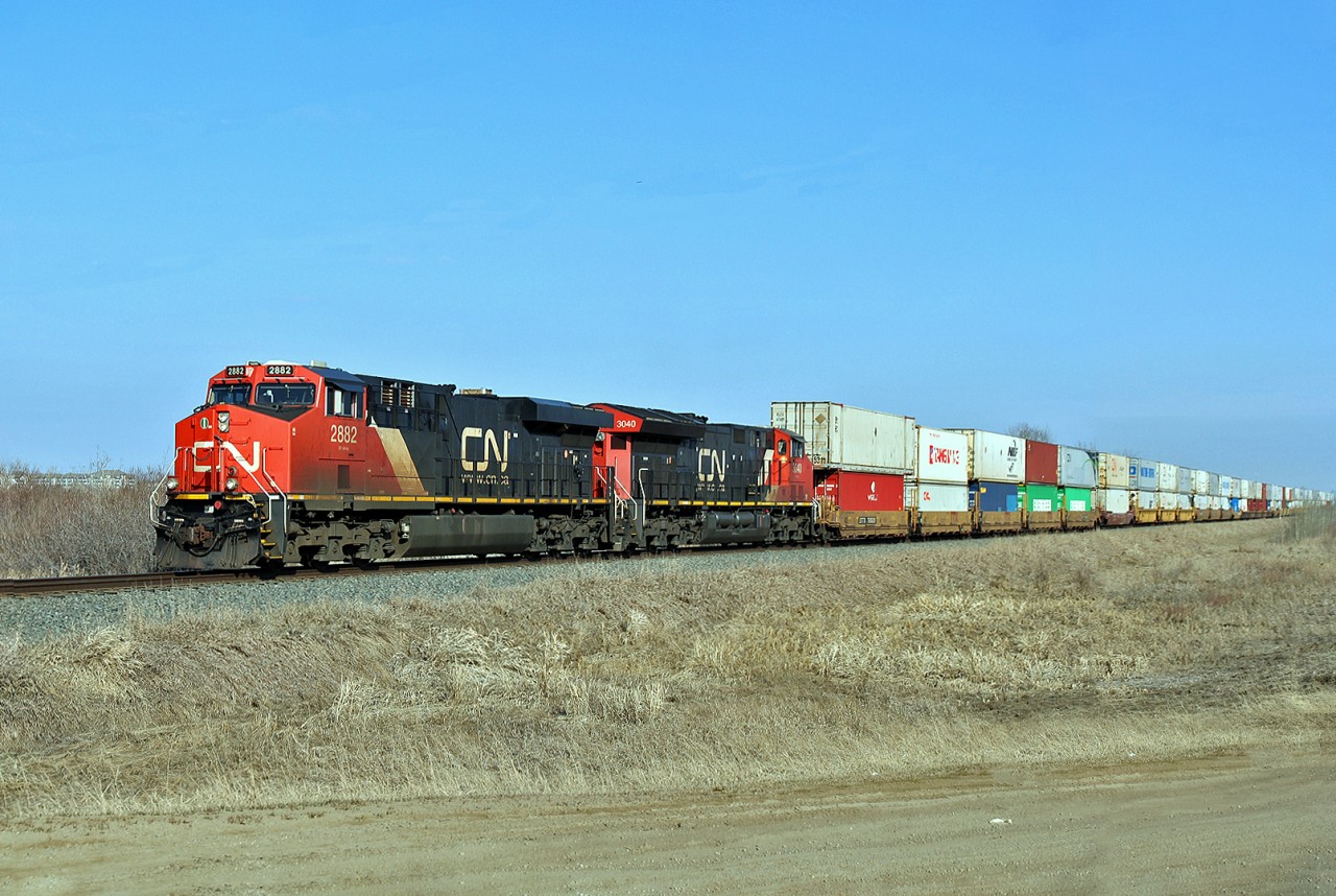 CN 2882 and 3040 head south with an intermodal on the Camrose Sub