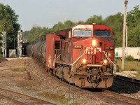 A Canadian Pacific ethanol train is eastbound through Guelph Junction with 9712 and 8719 as tail-end DPU on an early August morning. 