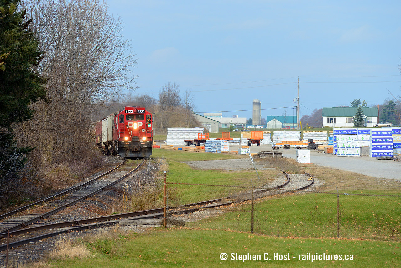 After lifting 20 cars from FS Partners of Ayr, the Ham Turn breaks the silence of this rural-rooted community with blasts of the horn as they approach Guthrie St. There is one other customer in Ayr, Tampa Hall at right, who makes trusses and floors amongst other products for the housing industry. I don't know if Tampa Hall is actively using rail but I rarely have seen a car in there.

I know very little about the history of the Ayr Pit spur - but you can see remnants of a line that ran along Greenfield Rd and I believe the pit was just south of it. You can tell the line's been here quite a long time though. It makes for a nice branchline feel though and why I'm attracted to it
Thanks to Aleks Stefanovic for alerting me to this one fine morning in Paris. Got some bucket list shots off my todo list.