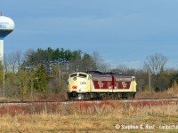 Ever book a day off work, that is planned for nothing but sunshine,wake up and all you see are clouds? This is what happened on the 25th - but I soldiered on anyway. Taking a friend from Montreal, we made sure to get to Ingersoll early to see the 0730 Cayuga sub (Aylmer/Tillsonburg South/Courtland) job work all over OSR's green earth and started at this spot just north of Salford in the edges of Ingersoll. After a 30 minute delay due to one unit not loading, the Cayuga job passed this almost identical scene in a 5 minute suckerhole of beautiful sunshine just as rain clouds approached from the north. With horns blasting for Ingersoll's many crossings, imagine our surprise to hear another horn show south of us by the 401 as the 0800 St. Thomas job follows the Cayuga job hot on their heels with a pair of F units. Talk about timing and picking the right spot. I'd continue to get lucky for more suckerholes at just the right moment, witness my next shot at <a href=http://www.railpictures.ca/?attachment_id=37388 target=_blank>Putnam </a> in which the sun briefly appeared only to frig off to clouds for another 45 minutes as we followed 'em to St. Thomas. More to come.