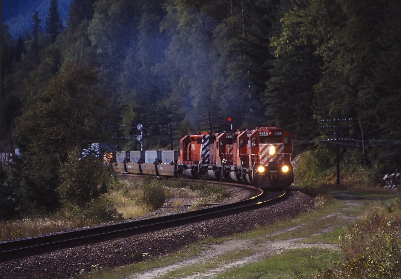 4 SD40 variants are eastbound with containers when SD40's were boring.......