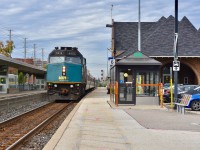 Rolling into Brampton on-time today, VIA Rail’s F40 6412 carefully slows Friday morning’s 84 to a gentle halt at the Downtown GO/VIA station to let on the few passengers who intend of taking the train. Time is 10:22 and it is a cloudy but cool autumn morning. 