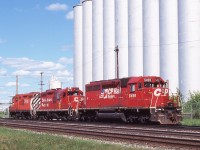 It seems only fitting to include a grain elevator in any railway image take at Thunder Bay. The city and grain have gone hand in hand for most of its existence. Unfortunately in more recent years some of the elevators have fallen silent for good as they are no longer needed but nevertheless grain still plays an important role in the cities economy, and both CN and CP still serve the city as well. CP has a number of units assigned to the city on any given day and on this day several decades of Canadian Pacific’s paint schemes were covered by this set of power. CP 5499 is one of a group of second hand SD40’s picked up in the mid 1990’s. The unit began life as Union Pacific 3004 and was rebuilt by MK into a SD40M-2. After several years out on the mainline the group found itself reassigned to yard duty, with a few always assigned to Thunder Bay.