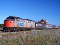 Amtrak 349 (ex-BN 9965, ex-CB&Q 9965) arrives at Windsor with Detroit to New York City train 64, the Niagara Rainbow.