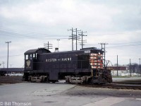 Looking a little worse for wear but still able to fulfill her lease obligation to CP, Boston & Maine Alco S4 switcher 1270 is seen at Woodstock, Ontario near the station in May of 1966. Due to her lack of MU, one could only assume she was assigned to local switching or yard power.<br><br>Ever the power-short railway, CP turned to leasing power in the early 60's rather than reactivating some of its stored steam locomotives. The financially ailing Boston & Maine was one of the handful of US railroads that lent some of its older or surplus power out to CP, including RS3's, GP7's, F-units and even a group of little Alco switchers. According to the <a href=https://www.bytownrailwaysociety.ca/index.php/branchline/branchline-pdf-files/file/241-1992-02><b>February 1992</b></a> issue of Branchline, a total of six Alco S2/S3/S4 switchers including 1270 were leased from the B&M by power-short CP between October/November 1965 and February 1967. Information suggests they were assigned out of St. Luc Yard in Montreal QC, but evidently at least the one unit here found its way to the southern Ontario area to work.