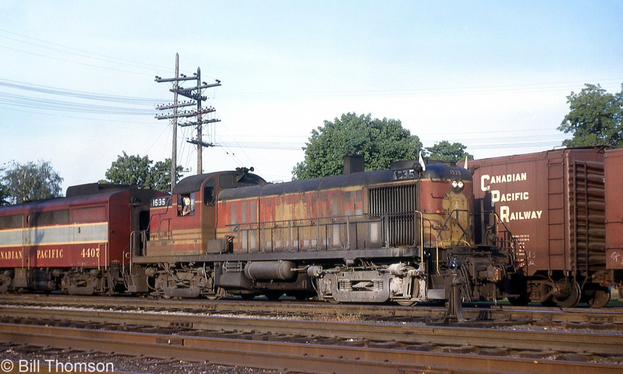 Boston & Maine RS3 1535, another one of the many US-owned units that power-short Canadian Pacific leased in the 60's, is pictured coupled to CP FB1 4407 at Woodstock in 1966.