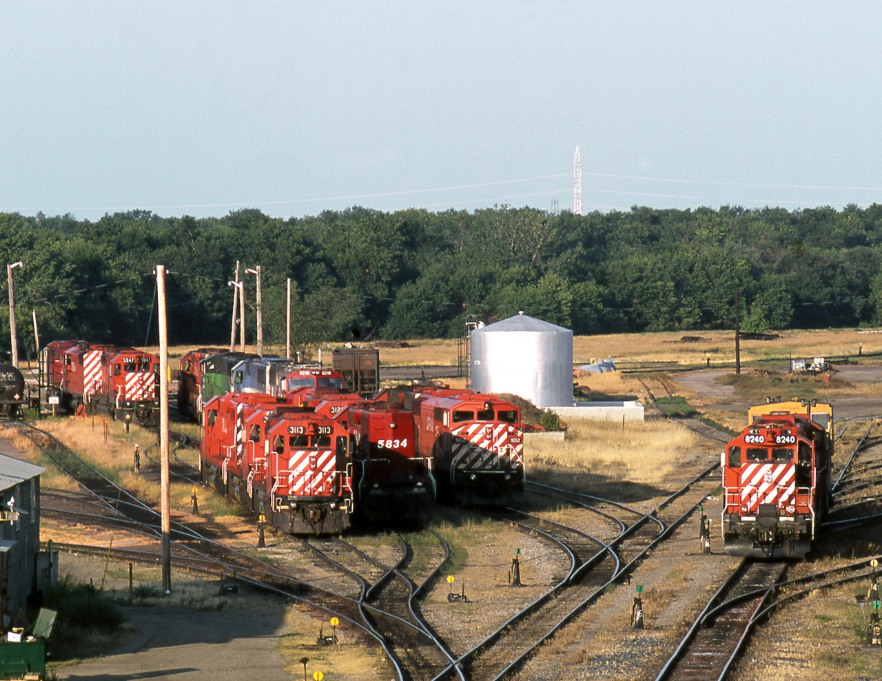Various power sits on the site of the dismantled roundhouse at Brandon. Buried deep in the lineup are 4 BNSF and predecessor units, just in off a Powder River coal train for the now defunct Brandon Generating Station. The coal is routed via BNSF to Minot thence CP via Portal Estevan Napinka and Souris, ironically passing the long time source for Manitoba  Hydro coal at Bienfait just east of Estevan