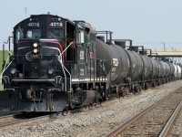 Waiting for a only a few minutes (they got their light right away) in the East Edmonton siding with a string of tanks that will be taken to the storage yard on the outskirts of town. It was a year ago that I last photo'd the 4018, it's still looking great. It was just as hot on that day too, with all the windows and doors open.