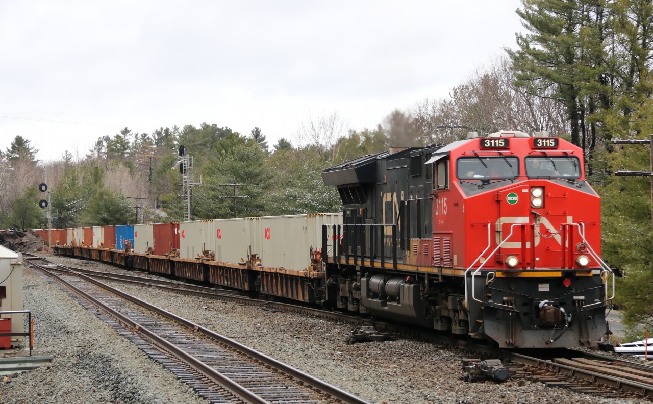 CN 3115 lead's an eastbound intermodal in South Parry.