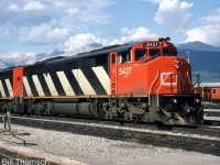 CN SD50F 5437 is shown with a sister unit at Jasper AB in July 1986, a little less than a year old.
<br><br>
5437 was one of 60 units manufactured by GMD London between 1985 and 1987 for CN based off the standard SD50 model, but with a full-width enclosed cowl body and a "Draper Taper" behind the cab for rearward visibility (named after the employee at CN who designed it). This design first debuted on CN's Bombardier HR616 order in 1982, and over the years CN would go on to order GMD SD50F, SD60F, and GE C40-8M models with this feature, until switching back to orders with conventional hoods in the mid-90's. The SD50F fleet would run until 2008 when they were retired. Some would be resold to a short line, but most were sold for scrap.