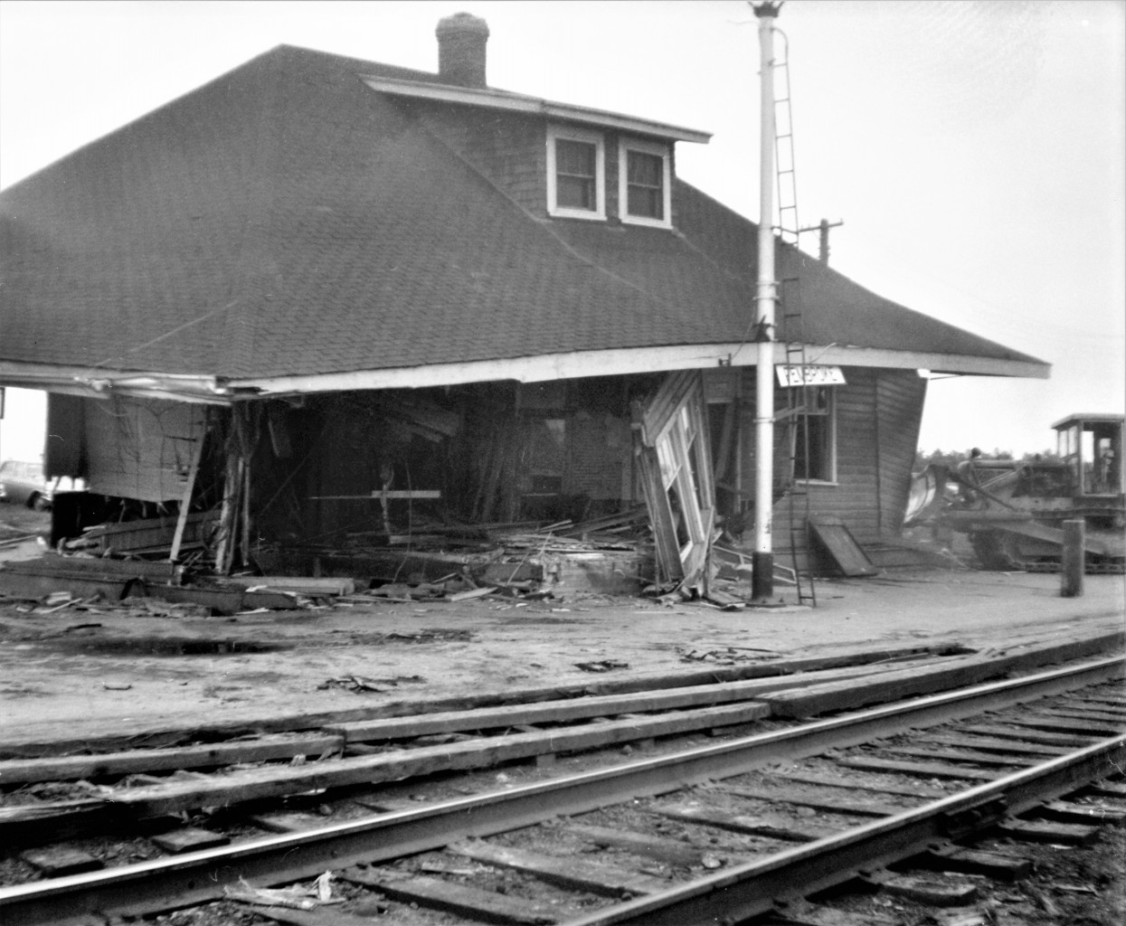 On the morning of Tuesday, August 31st, 1965, after westbound freight 401 passed, crews went to work to erase the old wood frame CN Pembroke Ontario station from the planet.  As the entire structure was deemed as scrap, no effort was made to save anything.  The process took only about a hour.  Location is approximate.