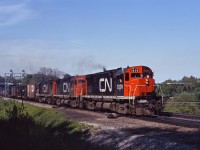 A trio of C424s (3226,3205, and 3223) lead a CN westbound freight through Bayview on a beautiful August evening.