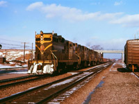 CN GP9 4567 leads three RS18s on a westbound freight at Aldershot on a winter afternoon in early 1963.