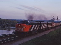 In the early 1970s, one could occasionally find CN passenger power in freight service. Here we have train 252, the Monday-Friday piggyback and container train just beginning its nocturnal trip to Montreal behind FPA4 6763 as well an F9B and FPB4. (Spadina was also know to "grab" units laying over and use them on Oakville sub runs.)