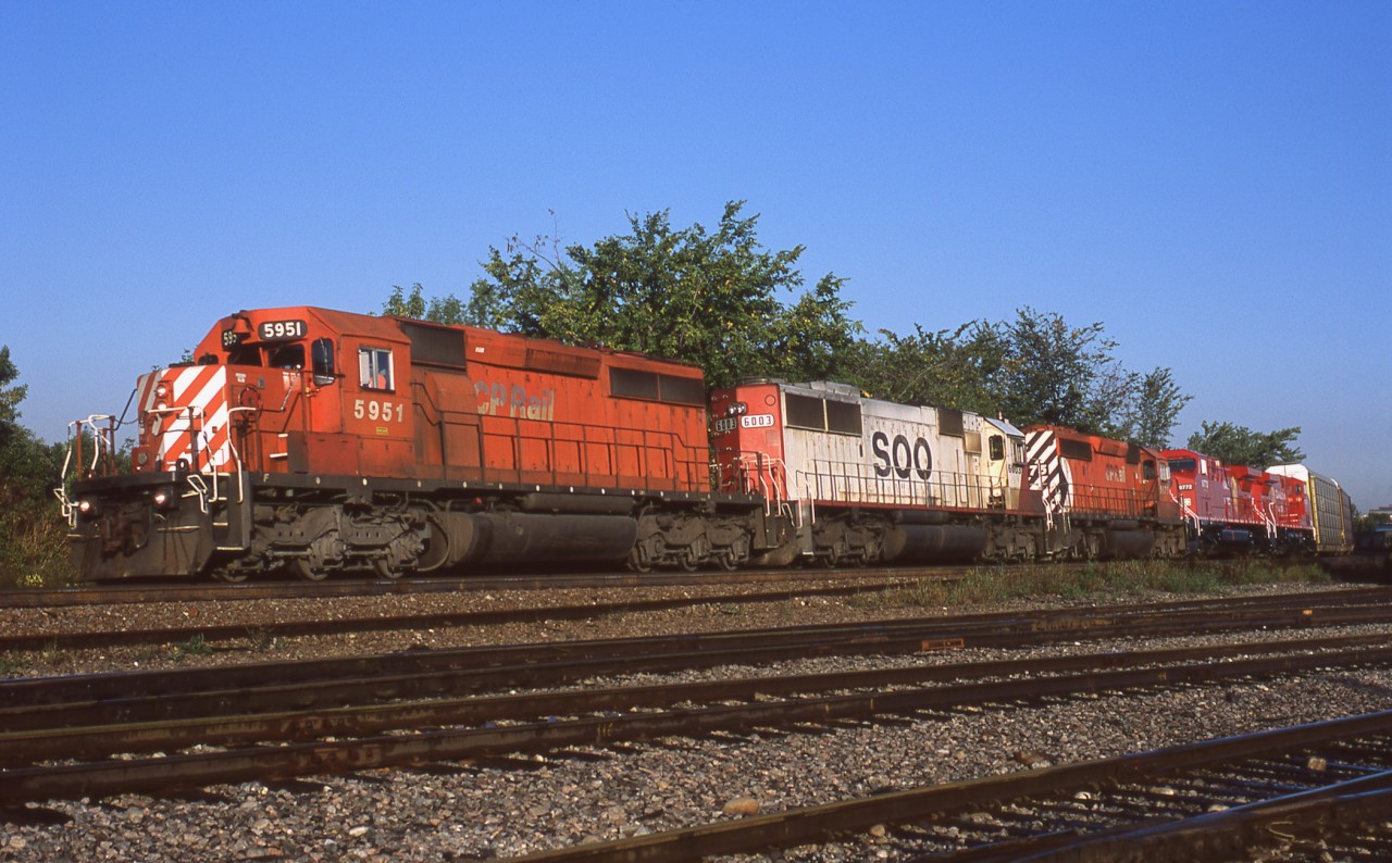 An early morning 419 rolls east through Streetsville Junction with 5951, SOO6003, 5675 and fresh out of Erie, 9772 and 9774.