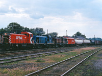 Back in the early 1970s, you never knew what you might find on a CP train--witness this SW1200RS/RS3/RS3/FPA2 (8143, B&M 1519 and 1536, 4082) consist heading east through Galt during the summer of 1970!