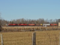 CP 330-316 (101 grain loads from Western Canada to QC ) rolls past the small BCRY yard/shop at Utopia on a beautiful March afternoon, today's unit grain train had CP 8874/CP 6258 (formerly SOO 6058) on the head end and CP 8617 working mid-train. 