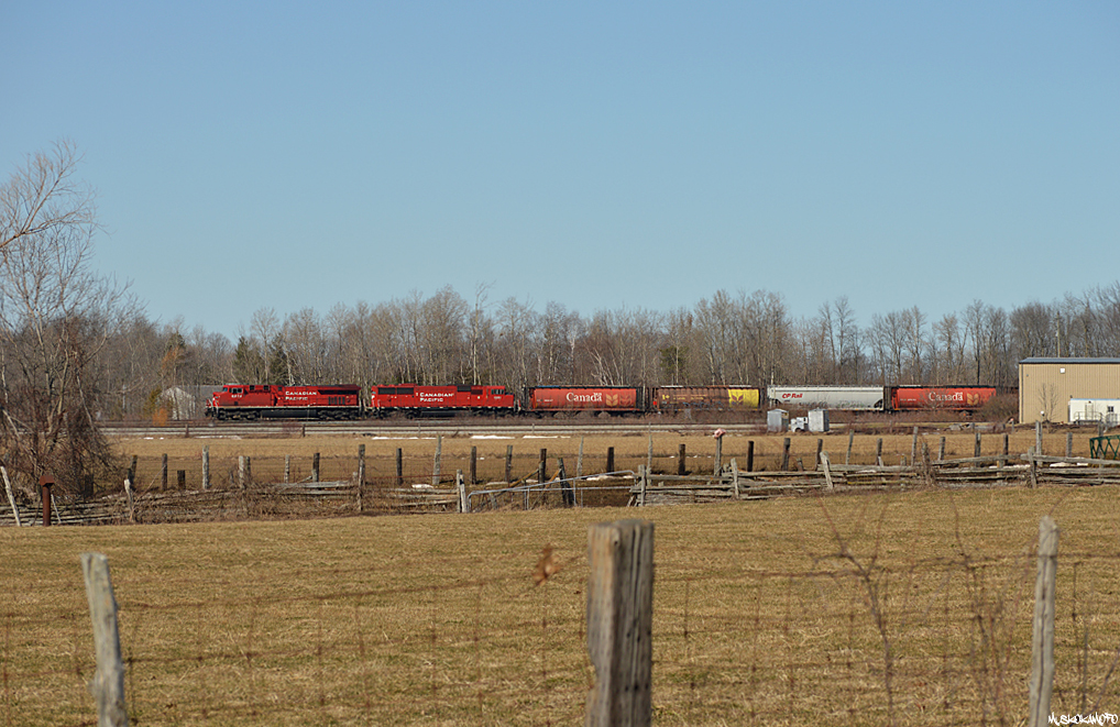 CP 330-316 (101 grain loads from Western Canada to QC ) rolls past the small BCRY yard/shop at Utopia on a beautiful March afternoon, today's unit grain train had CP 8874/CP 6258 (formerly SOO 6058) on the head end and CP 8617 working mid-train.
