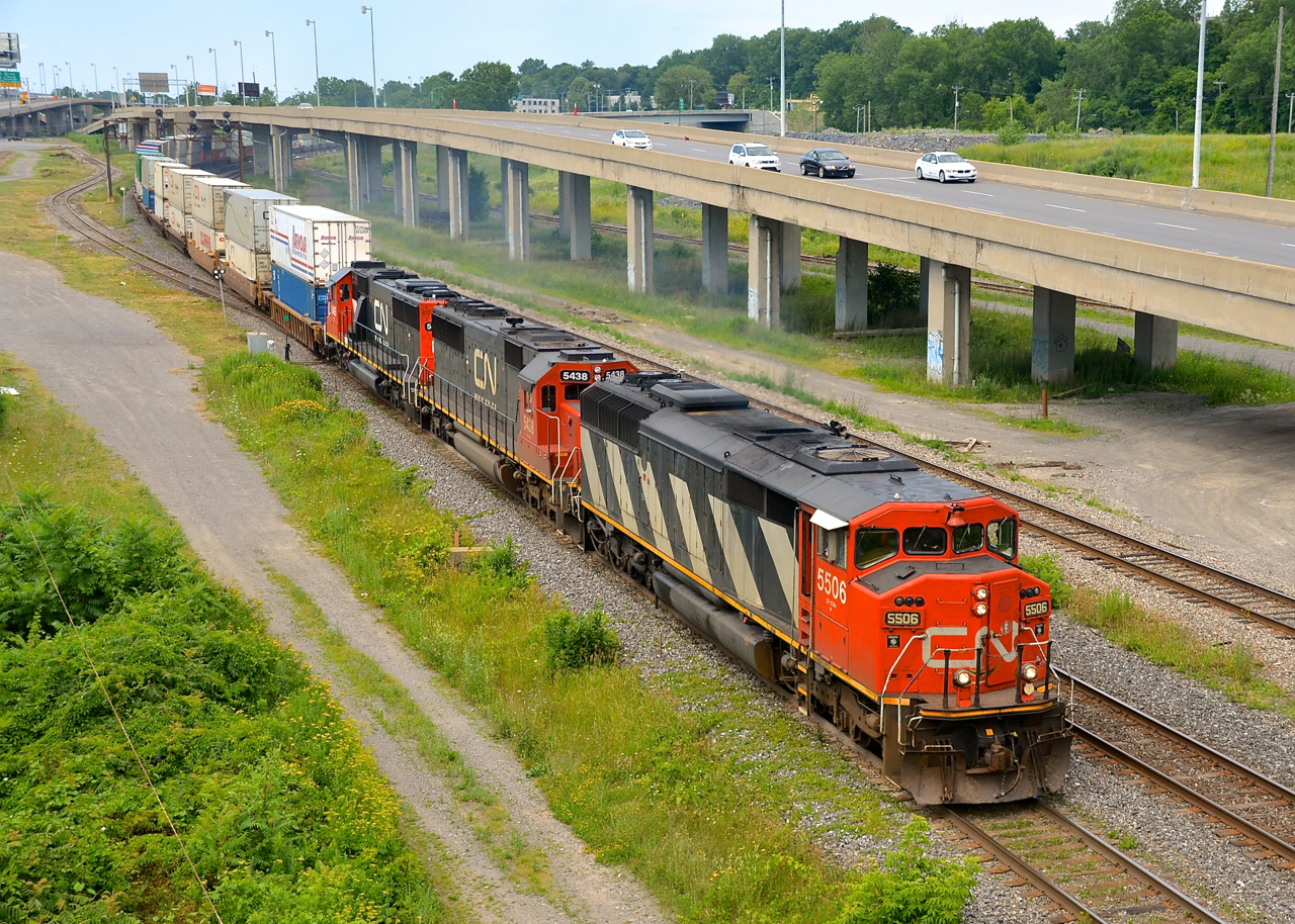 SD60F CN 5506 (now retired) and SD60's CN 5438 & CN 5405 lead CN 120 past the switch to the Lachine Spur. Service to the spur would be discontinued a bit over a year later, and the main line here moved further north last year due to highway work, which saw the elevated lanes at east removed as well.